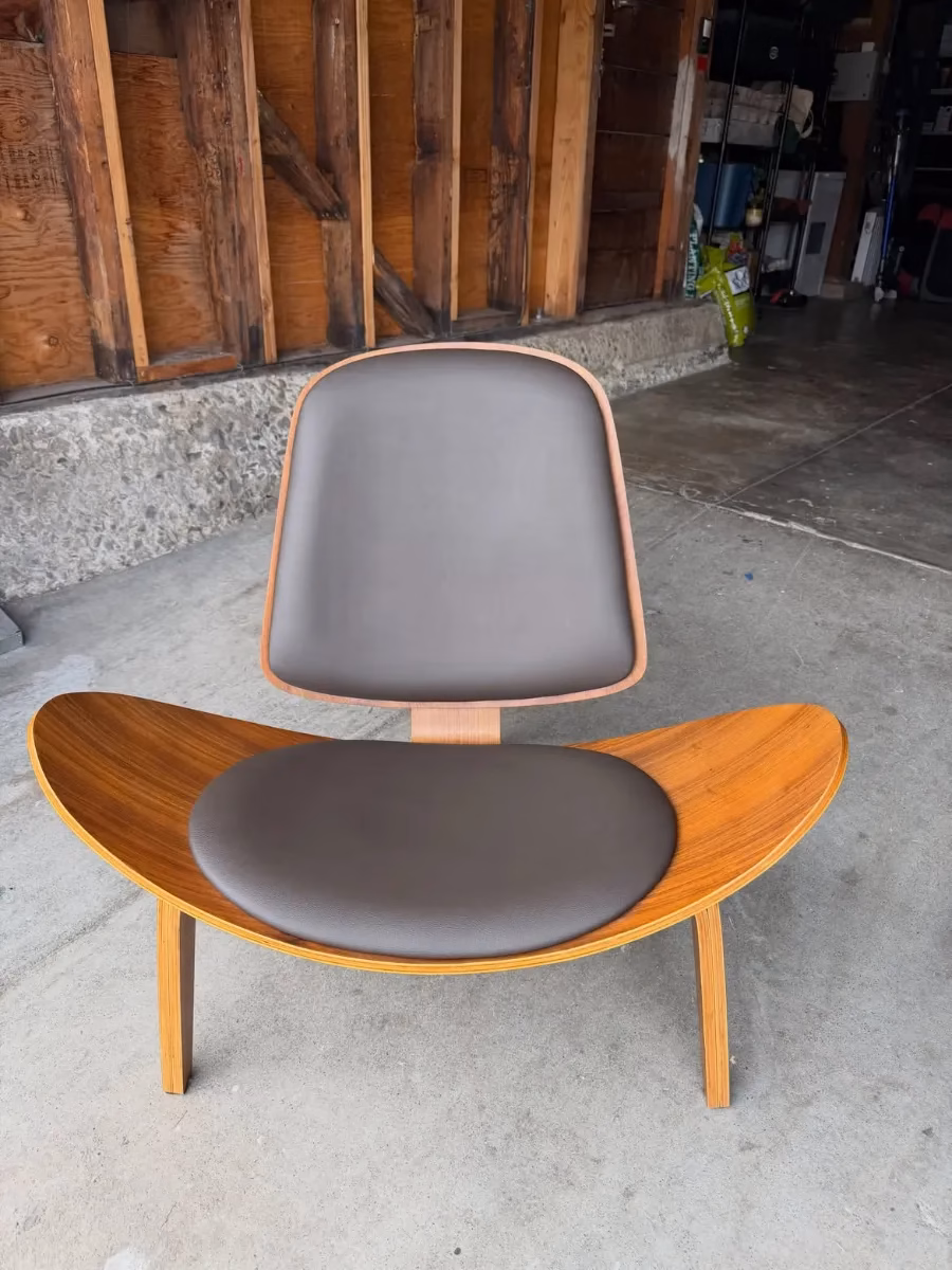 Brown lounge chair seat and back after restoration by Leather Repair Lab